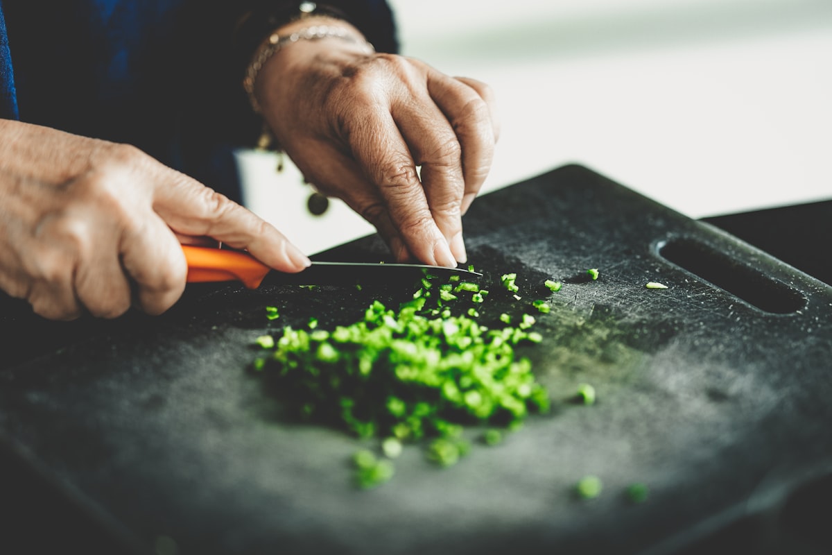 Editorial team members working together in a professional kitchen